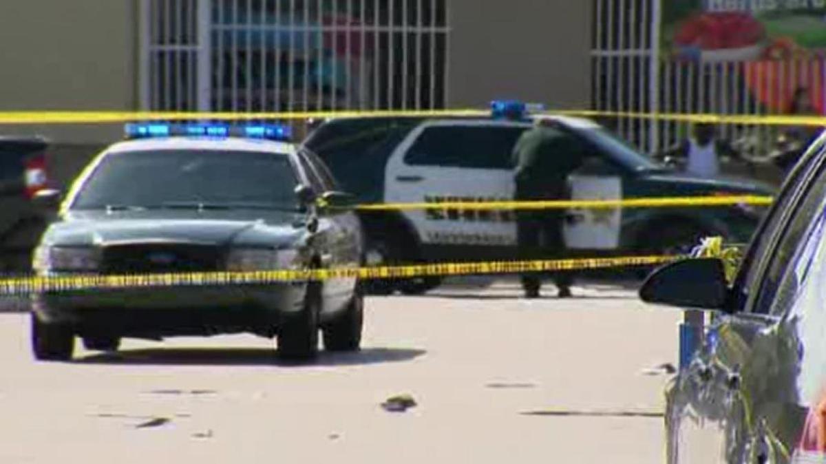 Police investigate a fatal shooting outside of a Wal-Mart in Lauderdale Lakes.