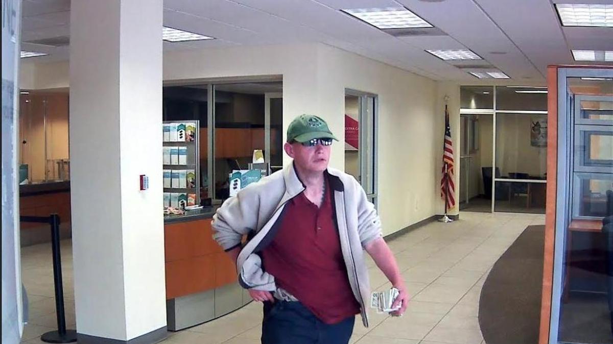 The FBI released photos of a man who investigators say robbed a Fort Lauderdale SunTrust Bank branch Tuesday.