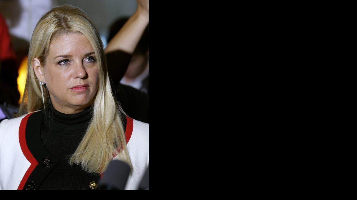 
Florida Attorney Gen. Pam Bondi looks on during as Florida Gov. Rick Scott delivers a campaign speech Monday, Nov. 3, 2014, in Clearwater, Fla. Bondi is yet to comment on a Miami-Dade judge’s decision to allow gay marriages.
