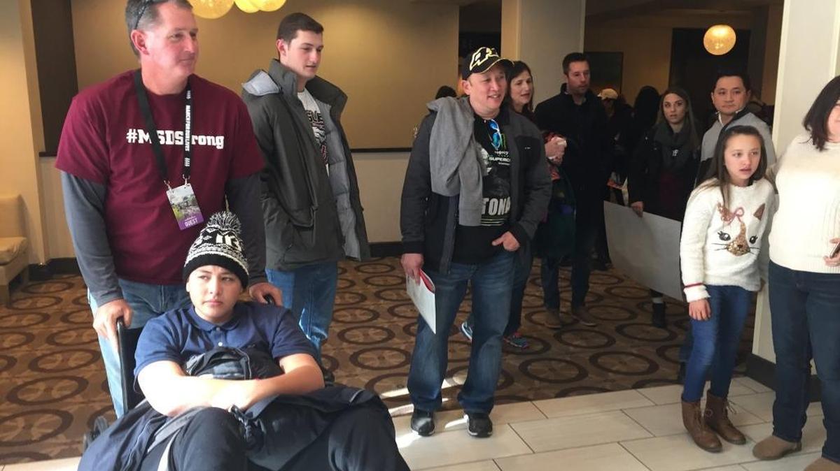 Freshman Kyle Laman is in a wheelchair after being shot in the foot at Marjory Stoneman Douglas High. But Saturday as he prepared for the #MarchForOurLives he was in good company. Jeff Heinrich, the first police officer Kyle saw after the shooting, is pushing his wheelchair.