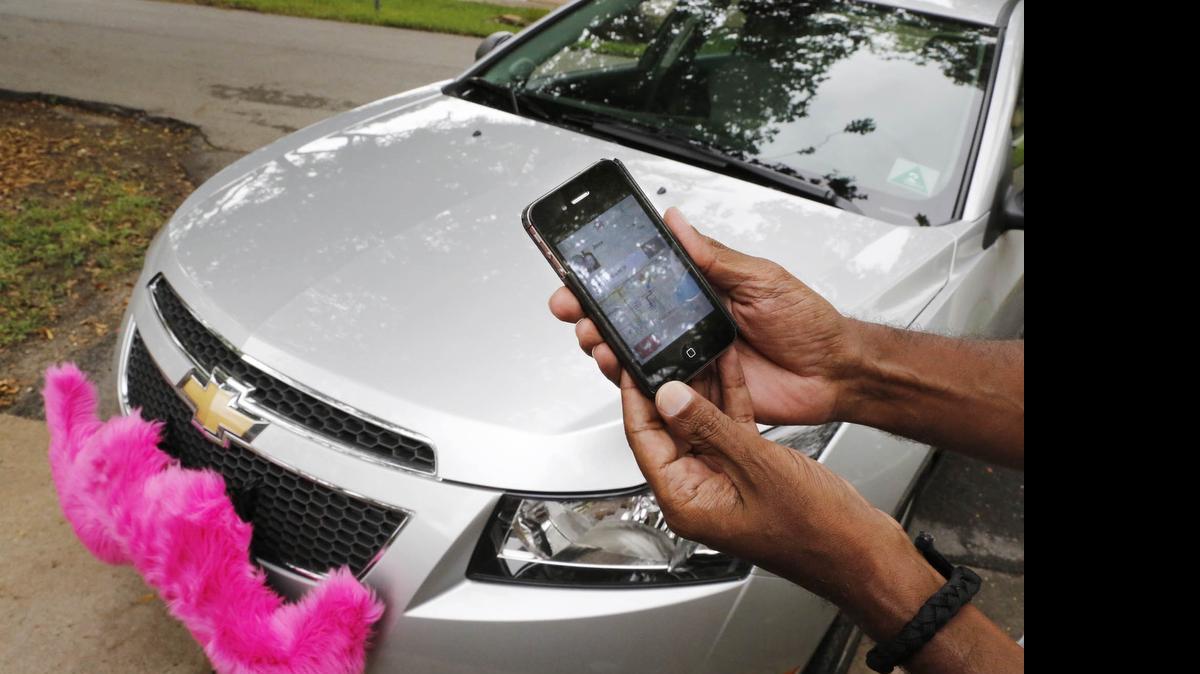
A Lyft driver’s car sports the company’s distinctive mustache.
