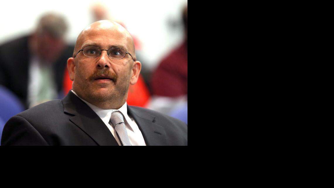 
Youssef Hassan Wardani listens in anger as the Broward County School Board on Tuesday, March 17, 2015, discusses the suspension of a Cypress Bay High French teacher for five days, for repeatedly calling his son a “raghead Taliban’’ when she addressed him in class. The student is of Lebanese and Moroccan descent, and is Muslim. The School Board suspended the French teacher, Maria Valdes, for five days without pay and required her to attend a diversity training program.

