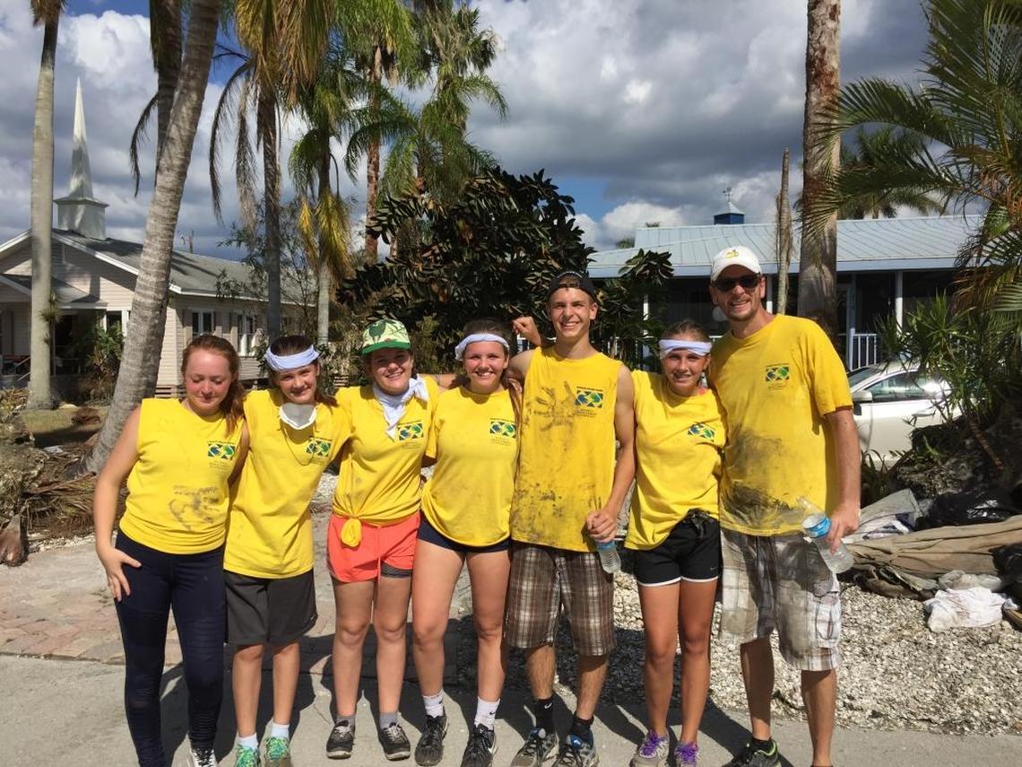 Alaina Petty, 14, poses with her fellow “Helping Hands” volunteers of the Church of Jesus Christ of Latter-day Saints after a Hurricane Irma cleanup in the Florida Keys.