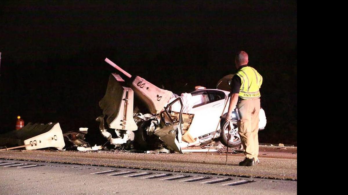 
Scene on I-75 after concrete barriers from a tractor-trailer fell onto Liza Angulo’s white BMW, killing the recent high-school graduate.

