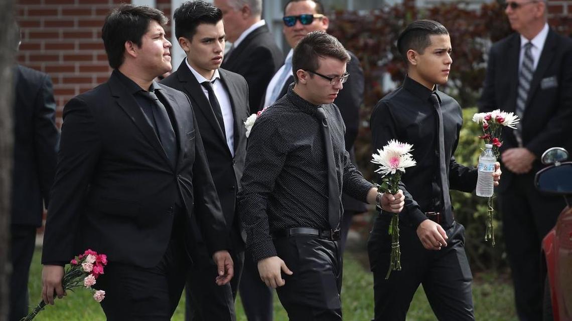 Mourners arrive for the funeral of Alaina Petty at The Church of Jesus Christ of Latter-day Saints on Feb. 19, 2018, in Coral Springs, Florida. Petty, a 14-year-old student at Marjory Stoneman Douglas High School, was one of 17 people killed in the Feb. 14 school shooting in Parkland.
