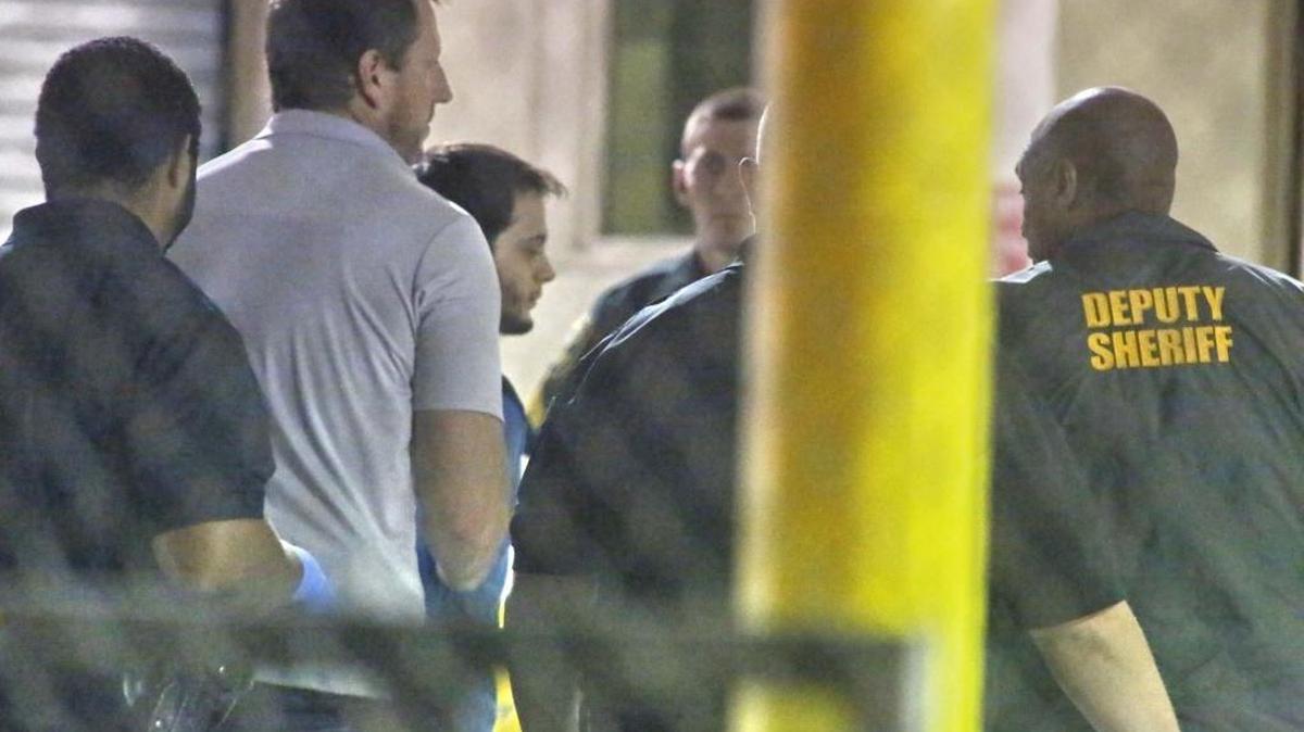 Esteban Santiago is taken to Broward County Jail on Friday, Jan. 6, 2017.