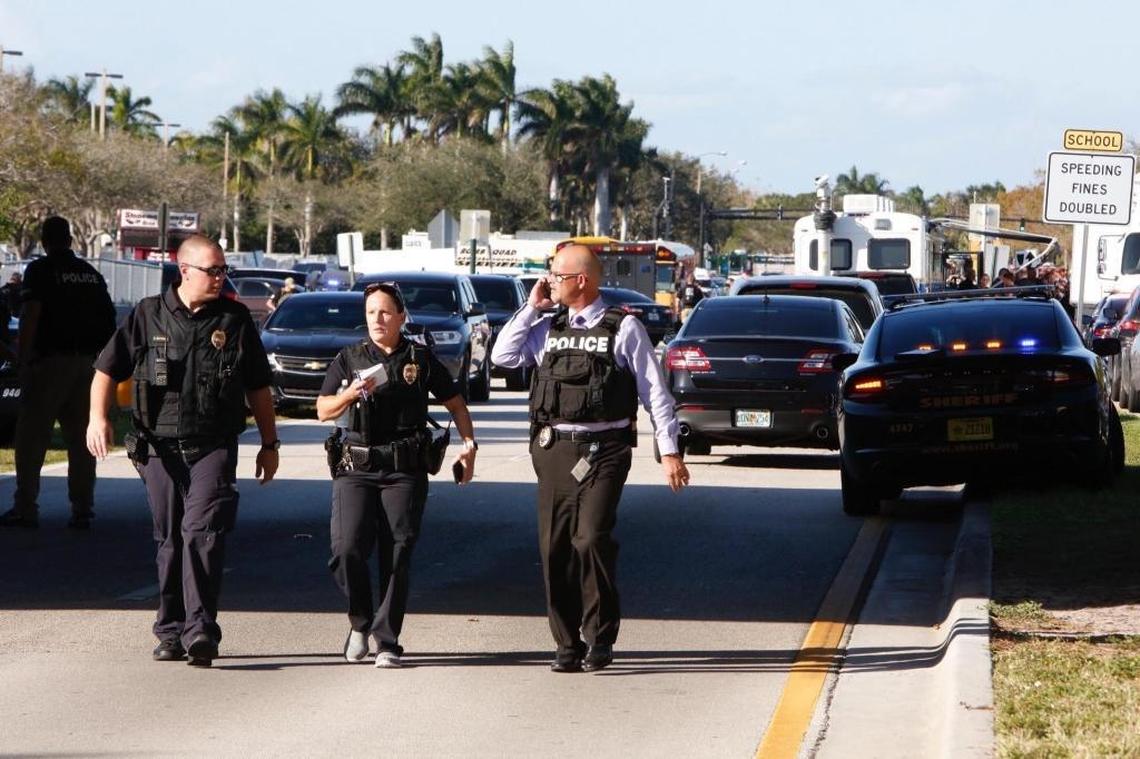 Law officers at the scene of the shooting at Marjory Stoneman Douglas High School in Parkland on Wednesday, February 14, 2018.