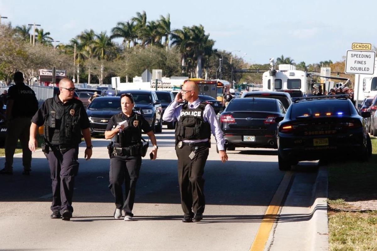 Law officers at the scene of the shooting at Marjory Stoneman Douglas High School in Parkland on Wednesday, February 14, 2018.