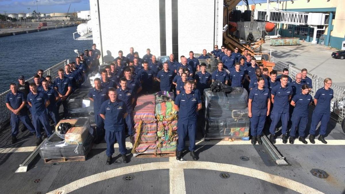 The U.S. Coast Guard Cutter Spencer crew poses Tuesday with 10 tons of seized cocaine.
