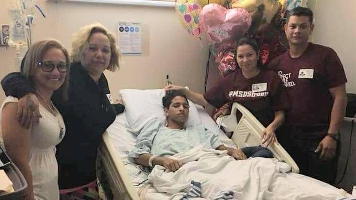 Anthony Borges with his family at the hospital after the Marjory Stoneman Douglas shooting. He underwent emergency surgery and is on a ventilator. His condition was upgraded from critical to fair on March 13, 2018.