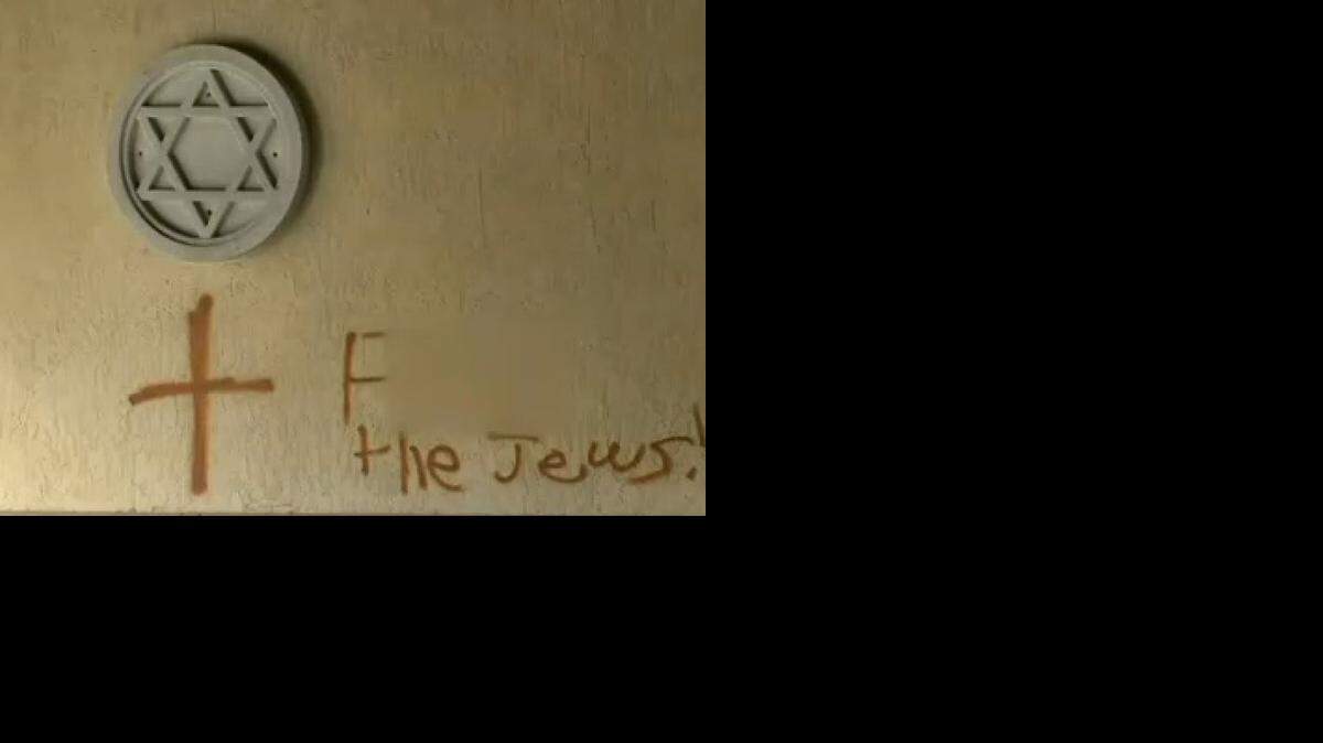 
This censored image shows a vandalized wall of B'nai Sephardim, 3670 Stirling Rd. in Hollywood. 
