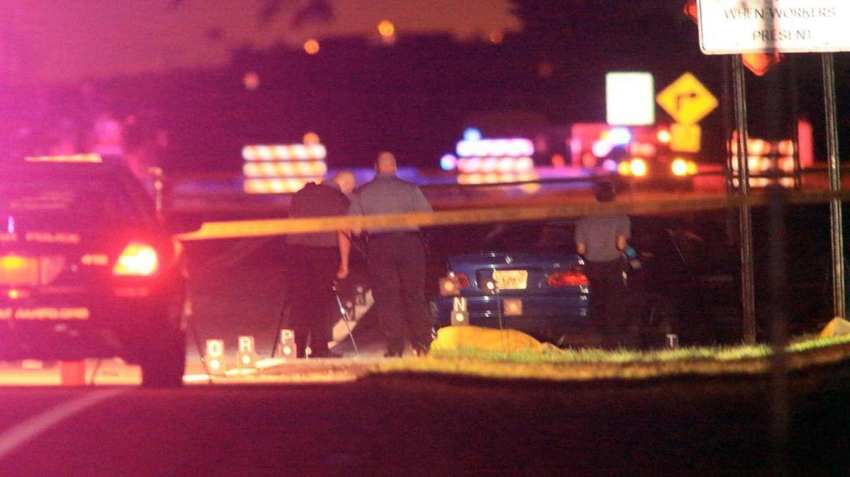 
The two victims were pushing this blue BMW when they were struck and killed by another car.
