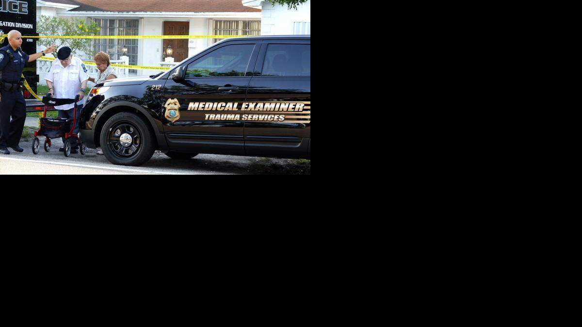 
Rabbi Malavsky, a Hollywood police chaplain, is escorted from the home, 5420 Johnson Street, where Ahizya Osceola 3, was found dead. Ahizya was the subject of a missing persons search.
