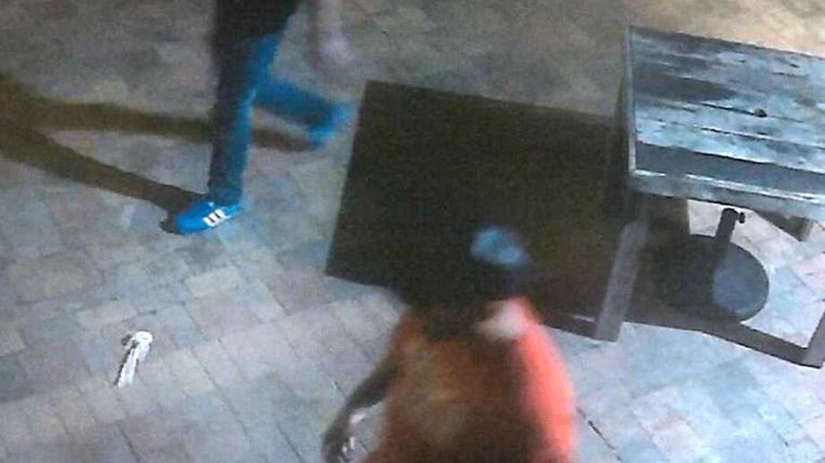Hollywood police are looking for the man in the black T-shirt and distinctive blue sneakers shown in this framegrab from a surveillance video, filmed before a machete attack at Mamacita's Restaurant, 591 North Broadwalk, at 2 a.m. Saturday March 26.