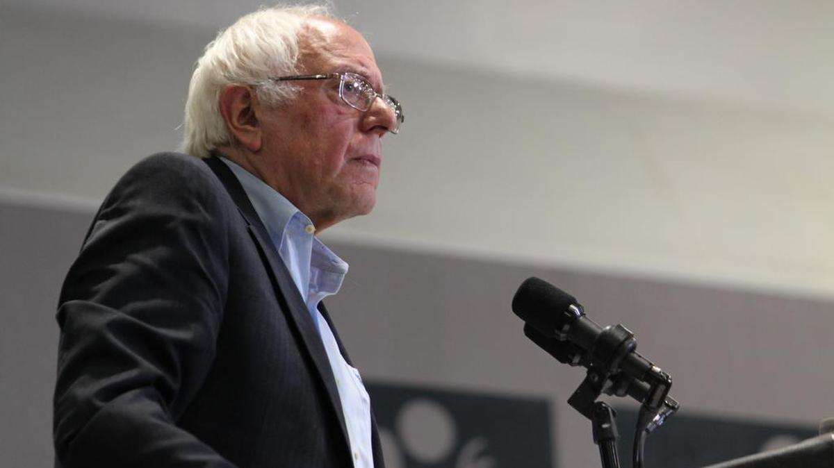 Bernie Sanders, showing speaking to a crown, said in an interview for CNN’s State of the Union that he will back Tim Canova against U.S. Rep. Debbie Wasserman Schultz’s in the Democratic primary race.