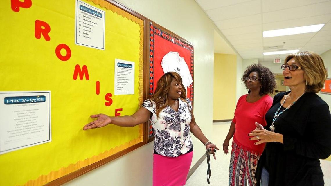
Broward County ended out-of-school suspensions several years ago — an approach that Miami-Dade will adopt this year as well. At Pine Ridge Education Center in Fort Lauderdale, Principal Belinda Hope talks with teachers Geraldine Bartelle and Laura Kolo about Broward’s “PROMISE” program, which aims to keep students out of trouble while being disciplined for bad behavior. It stands for Preventing Recidivism through Opportunities, Mentoring, Interventions, Support & Education.
