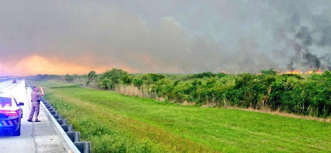 Wildfire closes parts of Alligator Alley.