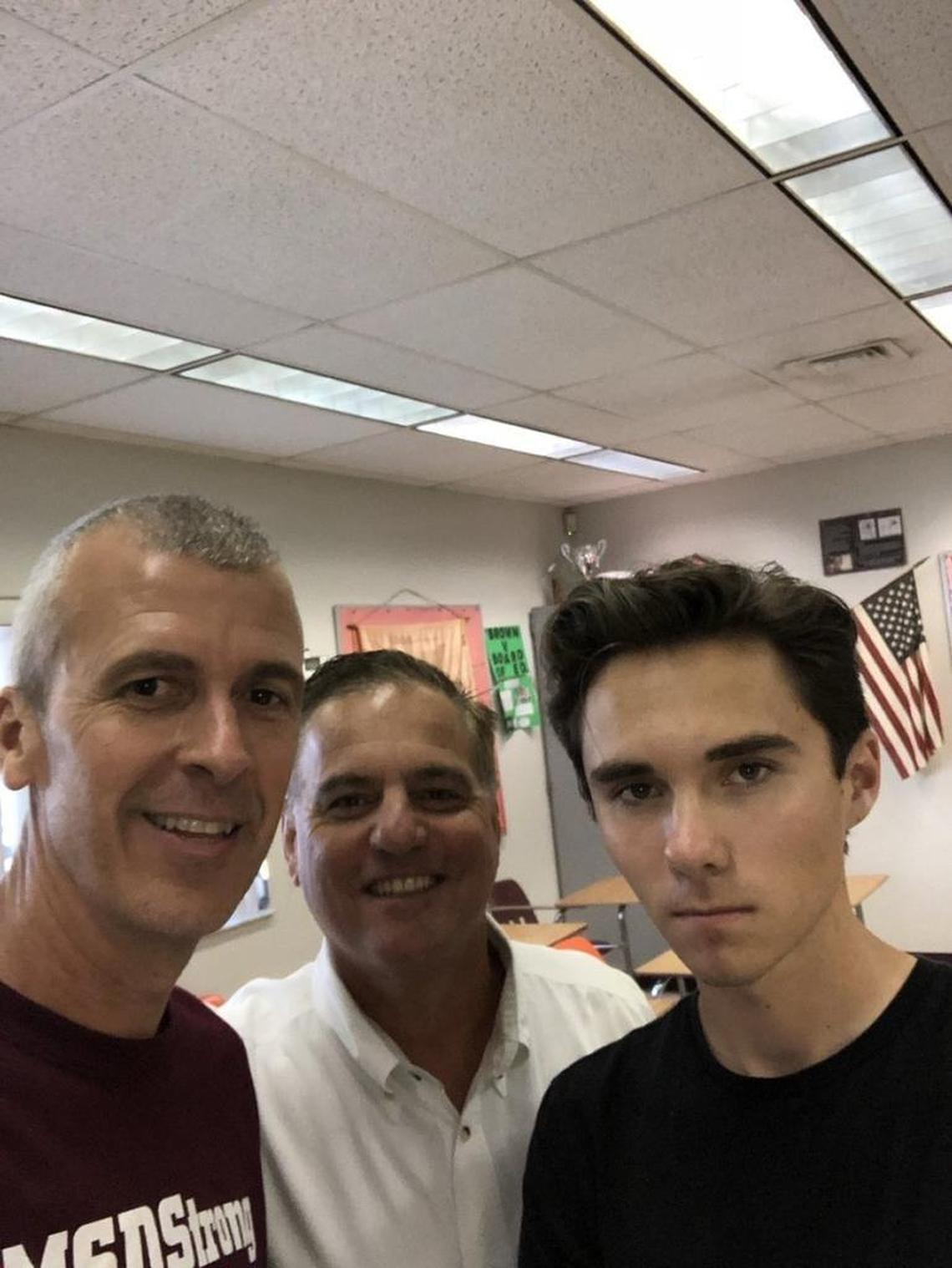 Jeff Foster, left, an advanced placement government teacher at Marjory Stoneman Douglas High, poses for a selfie with his student David Hogg, right. Foster has been credited with preparing many of his students for their new roles as student activists following last month’s school shooting that left 17 dead.