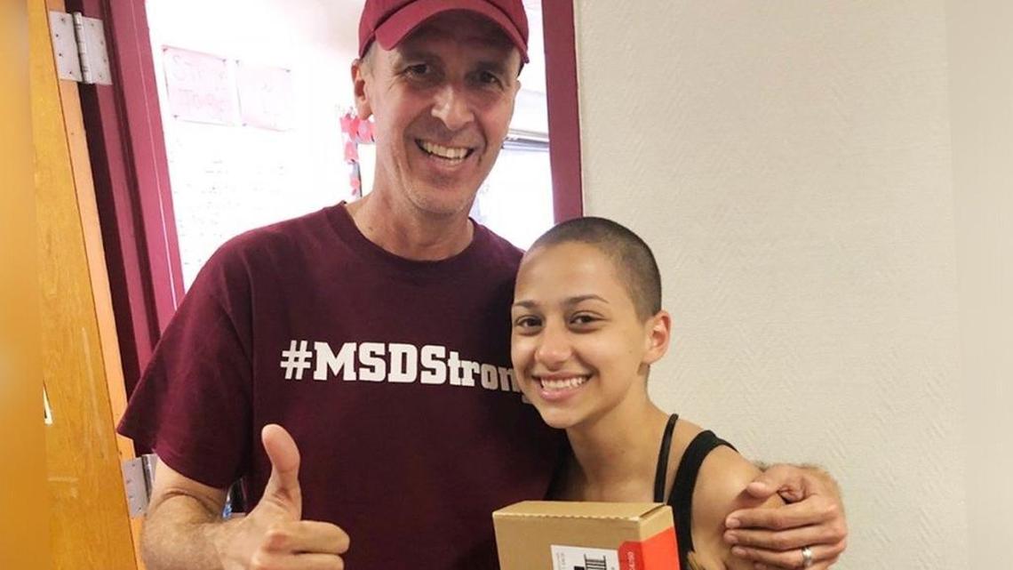 Jeff Foster, a teacher at Marjory Stoneman Douglas High, poses for a photo with his student Emma Gonzalez, a student activist and member of the #NeverAgain movement against gun violence.