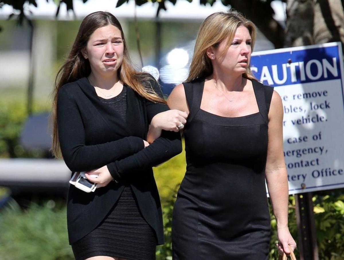 Mourners leave the Star of David Memorial Gardens Cemetery and Funeral Chapel in North Lauderdale after the funeral of Alyssa Alhadeff, Feb. 16, 2018. Alhadeff was one of the 17 victims killed in the mass shooting at Marjory Stoneman Douglas High School on Wednesday.