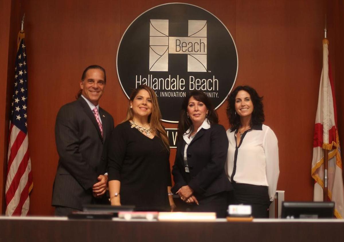 The Hallandale Beach City Commission before the city’s mayor, Joy Cooper, was arrested on Jan. 25, 2018. From left: Keith London, who is now acting mayor, Commissioner Anabelle Lima-Taub, Cooper and Commissioner Michele Lazarow.
