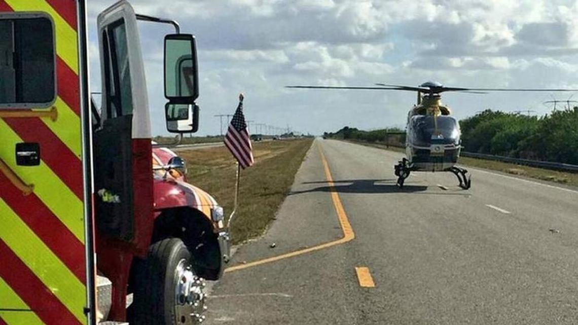 Broward Sheriff Fire Rescue arrives to airlift a duck hunter Friday to the hospital. The 50-year-old man was bitten by an alligator at the Holey Lane Wildlife Management Area in Broward County.