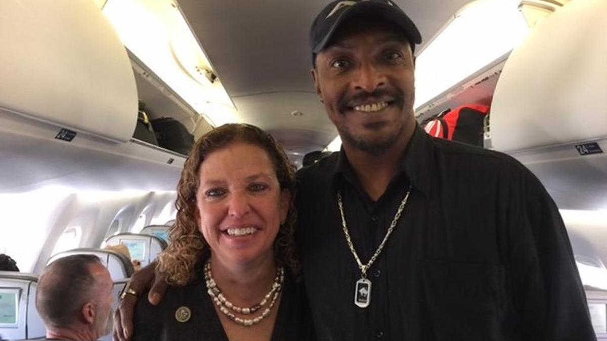 U.S. Rep. Debbie Wasserman Schultz posed for a picture with Muhammad Ali Jr. on their flight from Washington, D.C., to Fort Lauderdale on Friday.