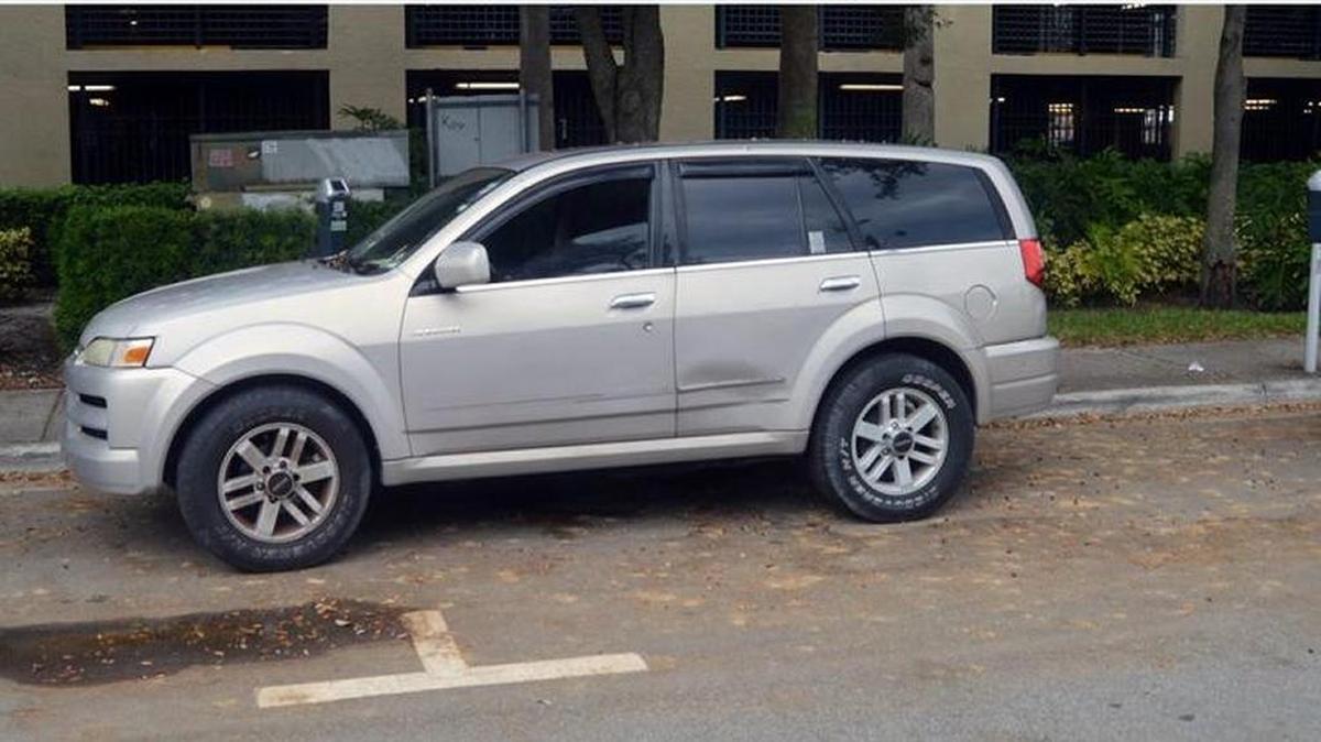 The Isuzu Axiom SUV that received five parking tickets. Owner Jacob Morpeau's body was found inside on the last day the SUV was cited.