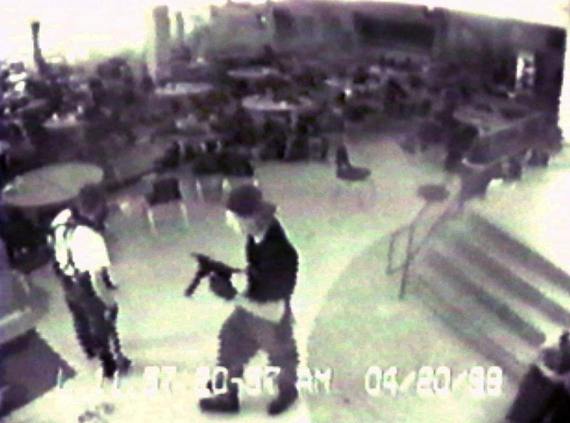 This frame from a video provided by the Jefferson County Sheriff’s Department shows Eric Harris, left, and Dylan Klebold during their April 20, 1999, shooting rampage at Columbine High School, in Littleton, Colorado, that left a teacher and 12 students dead.