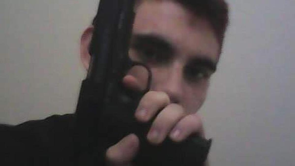 Nikolas Cruz had a bizarre and violent presence on social media, including this Instagram post showing him holding a handgun. He made racist and homophobic threats to classmates.