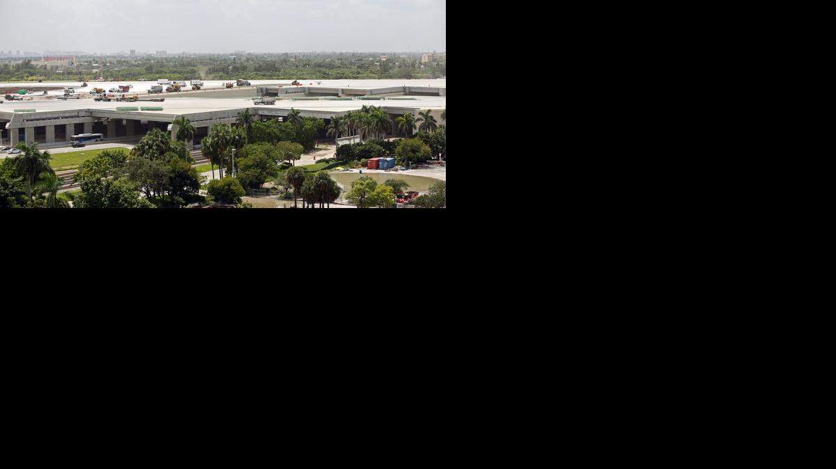 
The construction workers and equipment seen Wednesday will move out of the way Thursday when Fort Lauderdale-Hollywood International Airport opens its $719 million, 8,000-foot south runway. 
