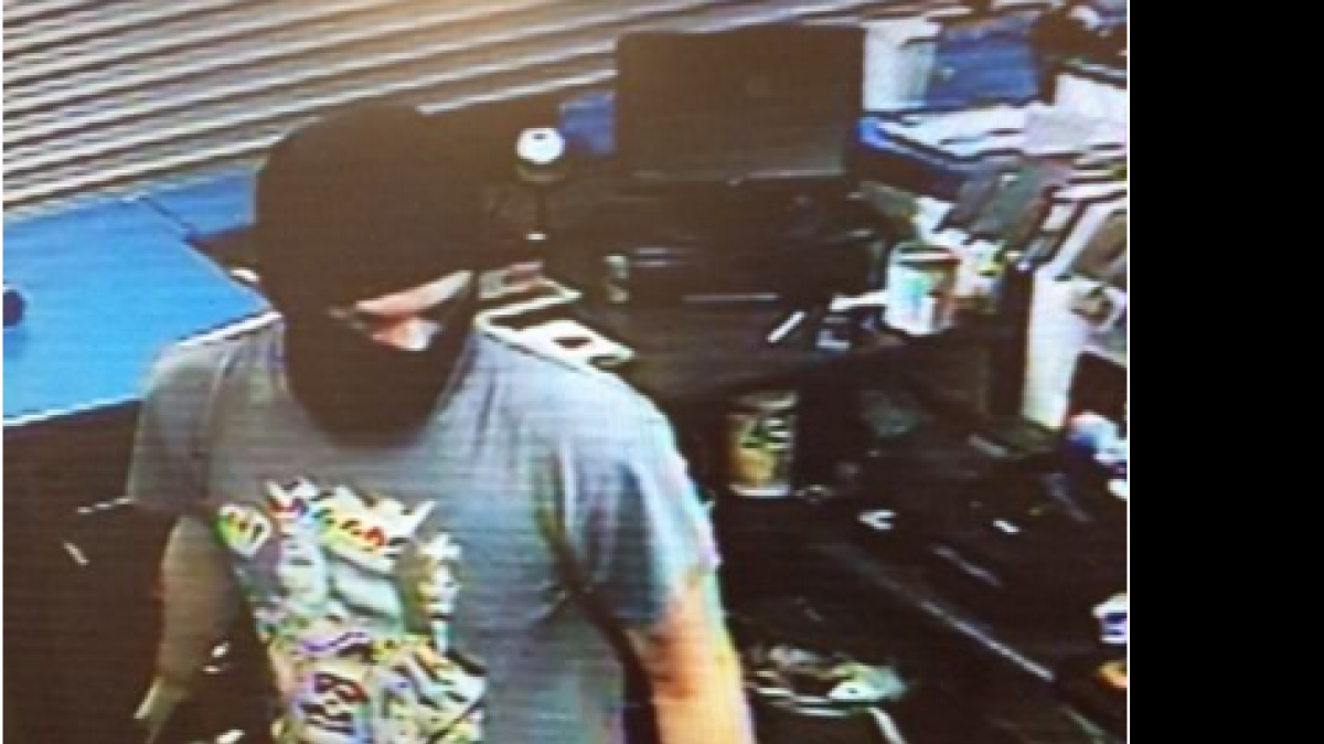 
The U.S. Postal Inspection Service released a photo of a man they say burglarized a post office in Davie early Wednesday morning. 
