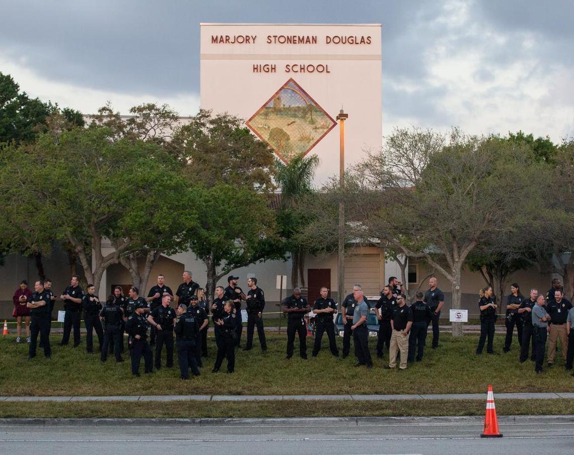 Law enforcement officers in front of Marjory Stoneman Douglas High on the first day of classes since the Feb. 14 shooting.