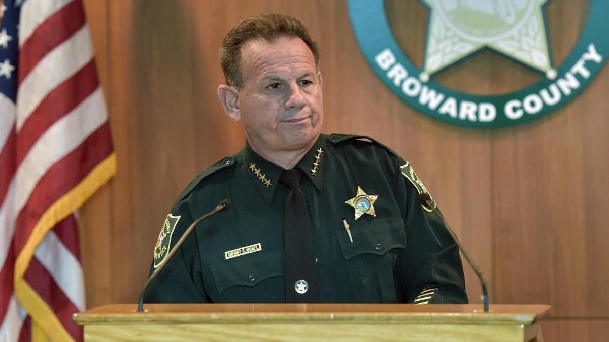 Broward County Sheriff Scott Israel announces to the media that Deputy Scot Peterson has retired from the department, Thursday, Feb. 22, 2018. Peterson was placed under investigation by the division of Internal Affairs after the discovery that he was at Marjory Stoneman Douglas High School at the time of the Feb. 14 shooting and failed to enter the building to pursue the shooter.