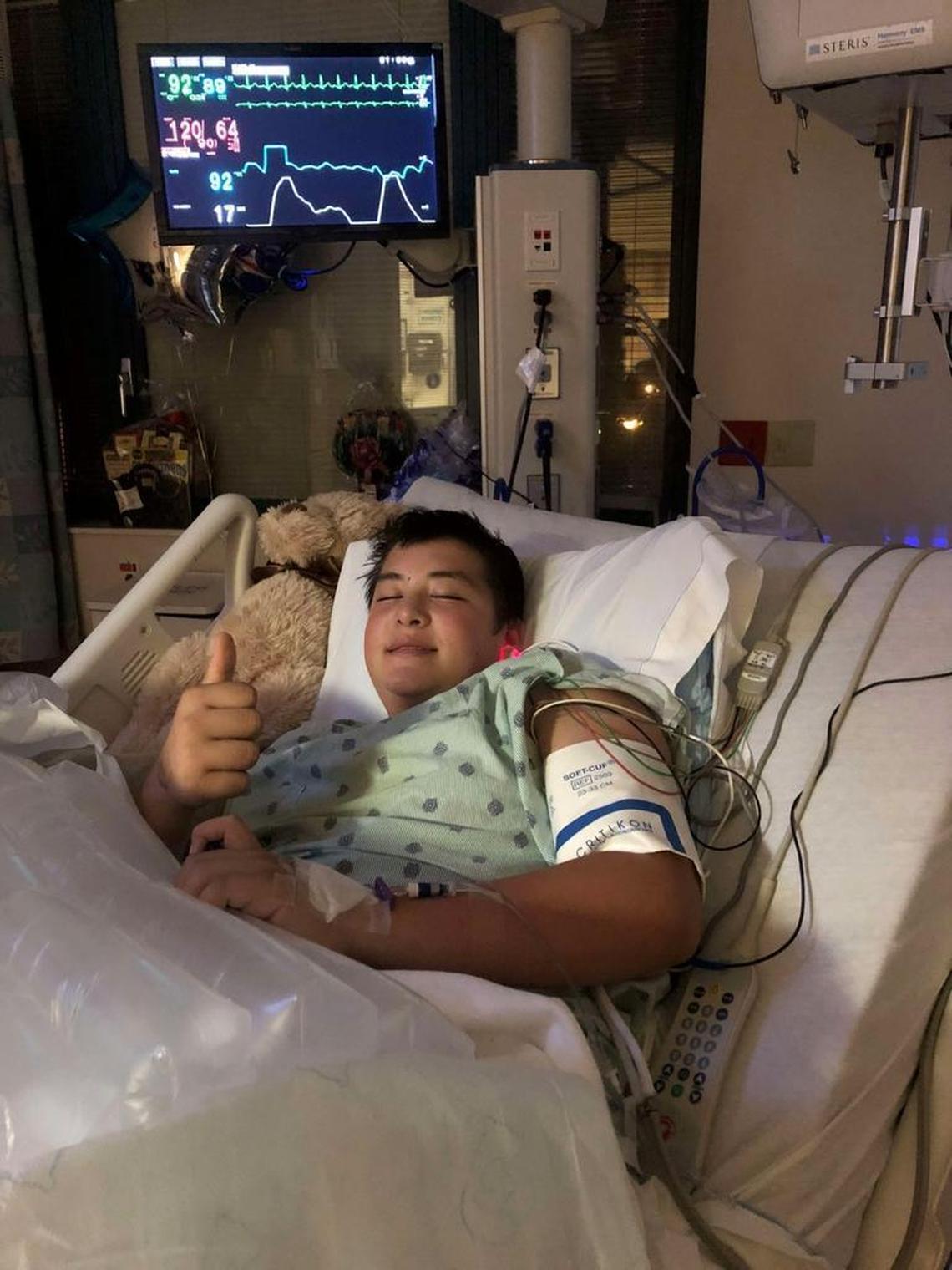 Kyle Laman, a 15-year-old freshman at Marjory Stoneman Douglas High School, after he underwent a nine-hour surgery to transfer a portion of skin and muscle from his thigh to his right ankle. The surgery left him with metal rods in his foot.