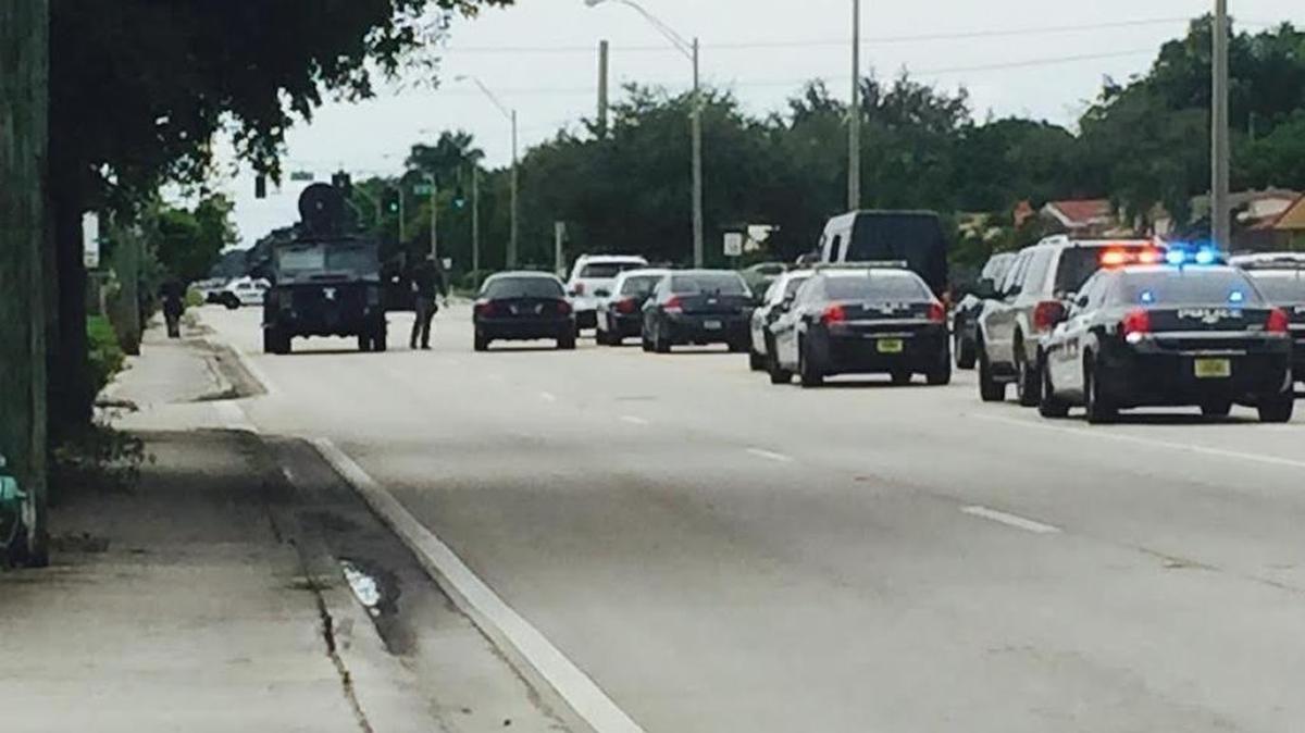 
Hollywood police block Taft Street during a standoff with an armed man with a child inside.
