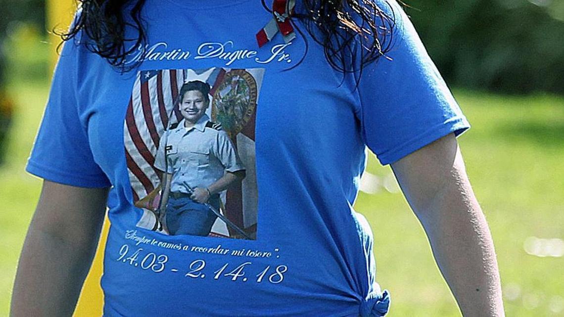 A mourner wears a T-shirt in tribute to Martin Duque, a victim of the shooting at Marjory Stoneman Douglas Senior High at his funeral on Sunday, Feb. 25, 2018.