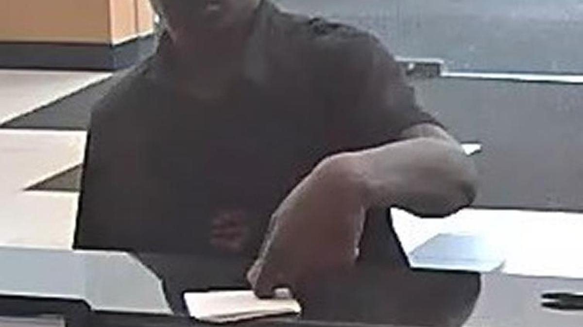 The FBI released photos of a man investigators say walked into a Fort Lauderdale TD Bank branch Tuesday afternoon and demanded money.
