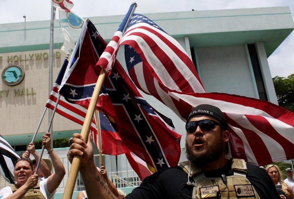 Tiny Threeper, right, protests in front of Hollywood City Hall on June 21 to oppose the renaming of Lee, Hood and Forrest streets.