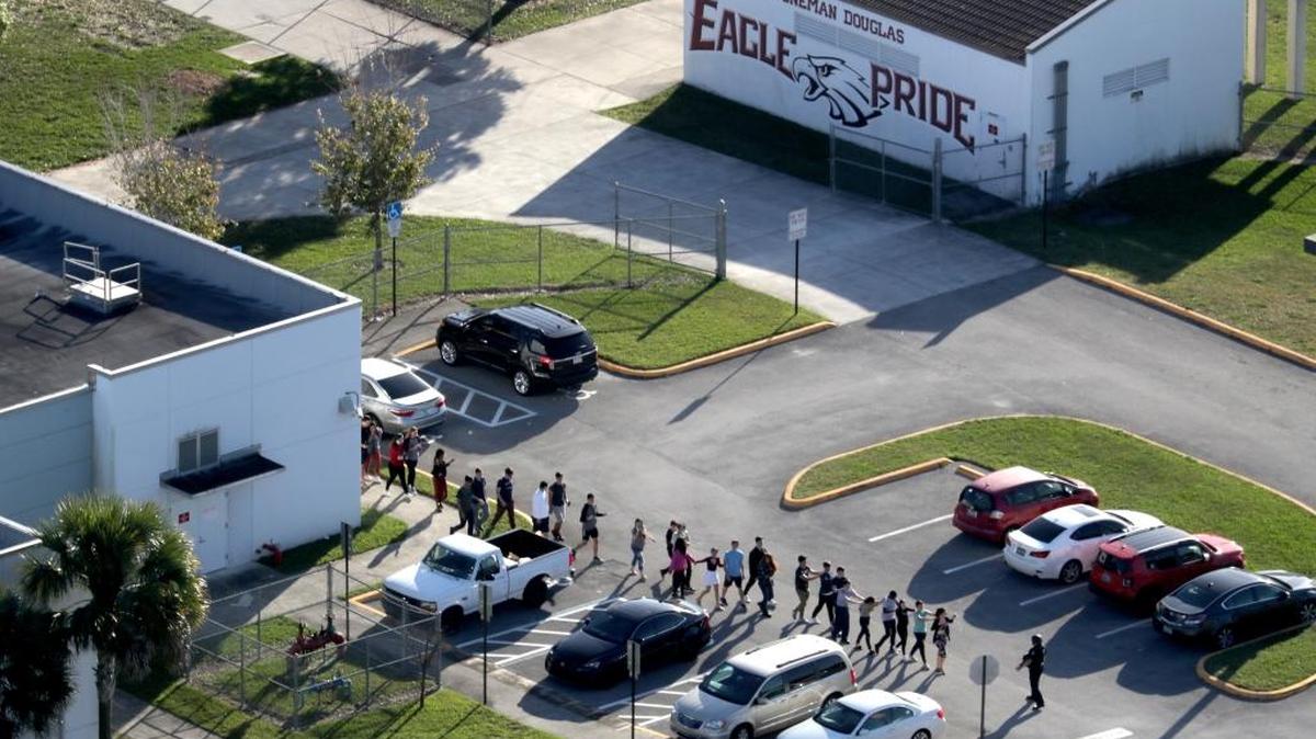 Legislators visited Marjory Stoneman Douglas High School in Parkland, where students were evacuated by police after a shooter opened fire on the campus.