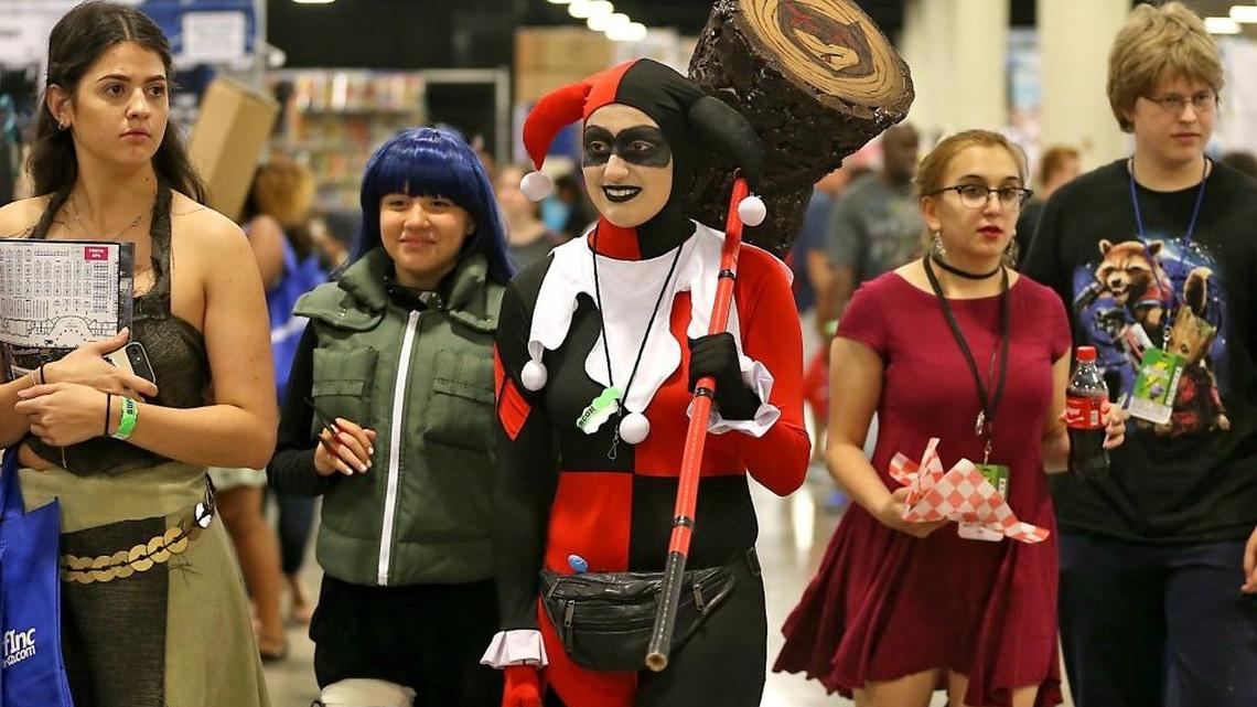 Victoria Betancourt, 20, of Hollywood, dressed as “Harley Quinn” from Batman, walks with friends as Florida Supercon opens at the Broward County Convention Center on Thursday, July 27, 2017.