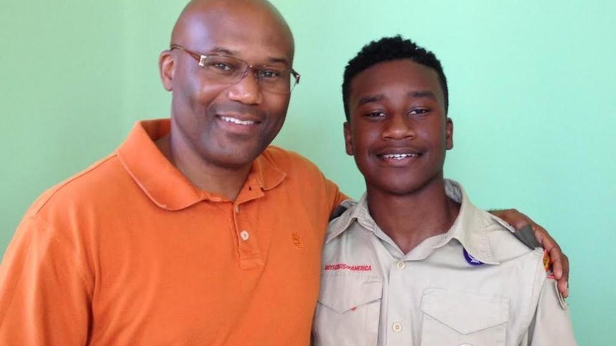 
Boy Scout Kairos Philando, right, saved his father’s life last year when he was choking on pineapple.
