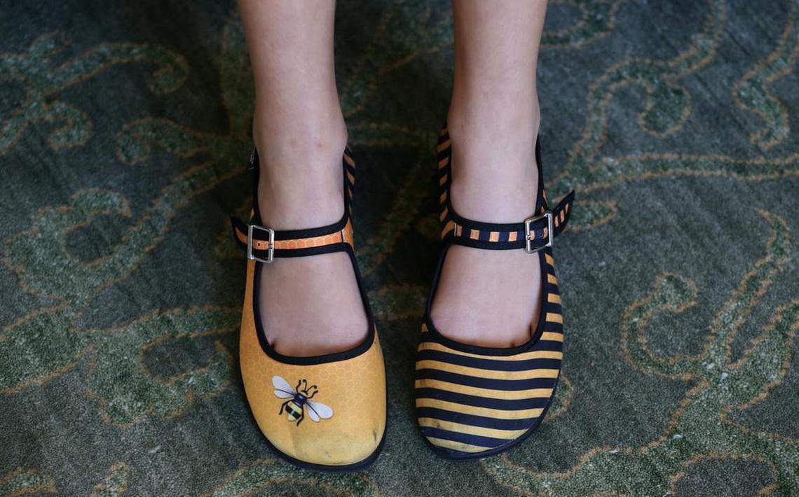 Simone Kaplan, 11, wearing her bee adorned shoes on Sunday, May 21, 2017, is headed to the Scripps National Spelling Bee in Washington, D.C. Simone is a student at St. Bonaventure Catholic School in Davie.