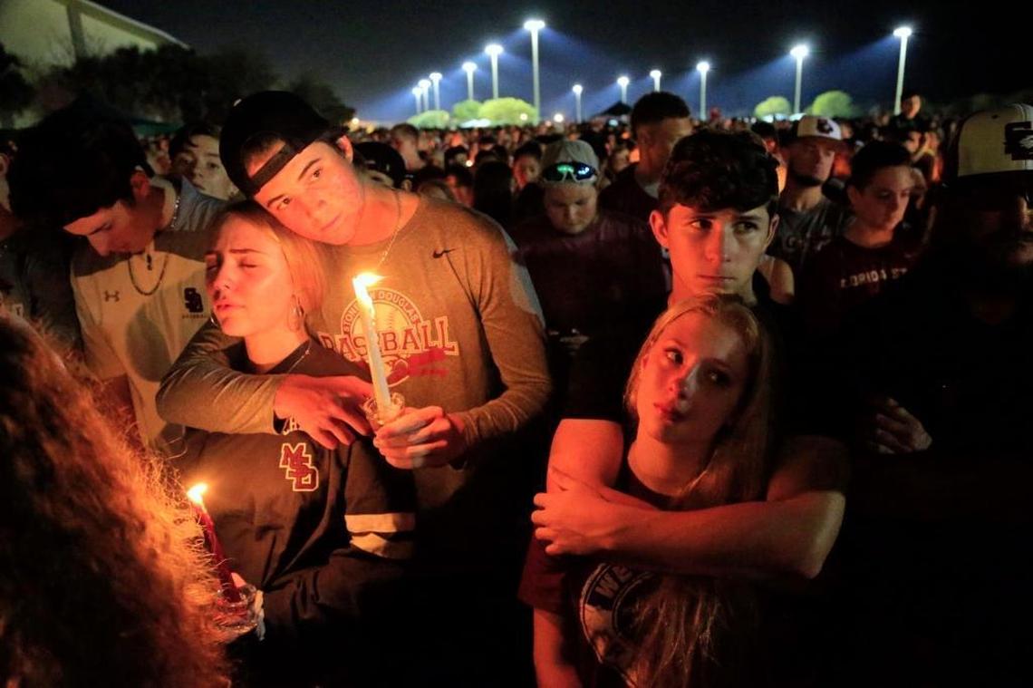 A vigil at Pine Trails Park in Parkland for victims of the shooting at Marjory Stoneman Douglas High School.