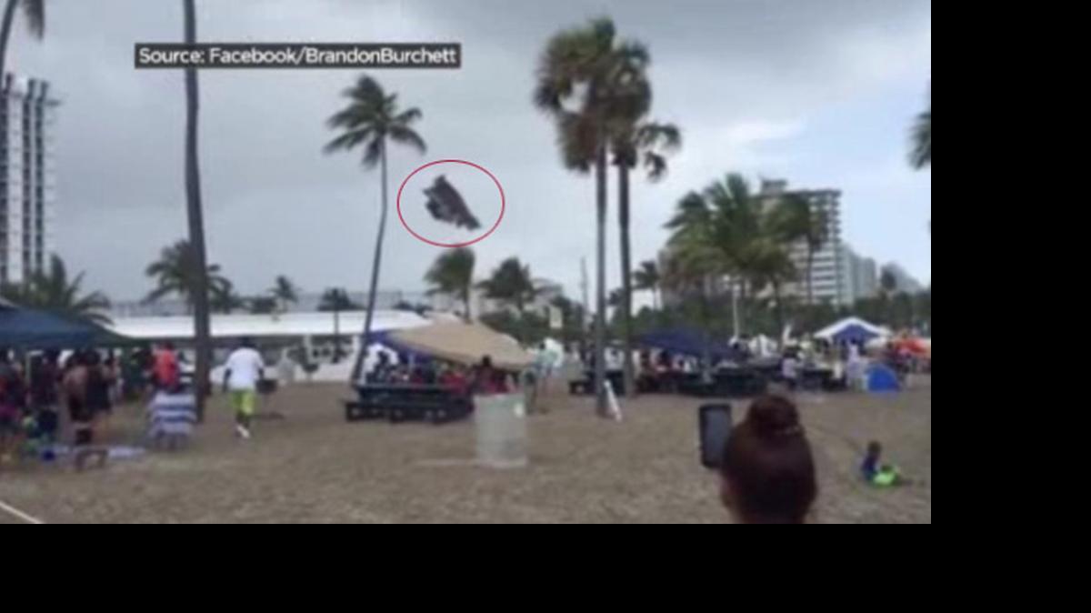 
A waterspout lifts a bounce house on Fort Lauderdale Beach. 

