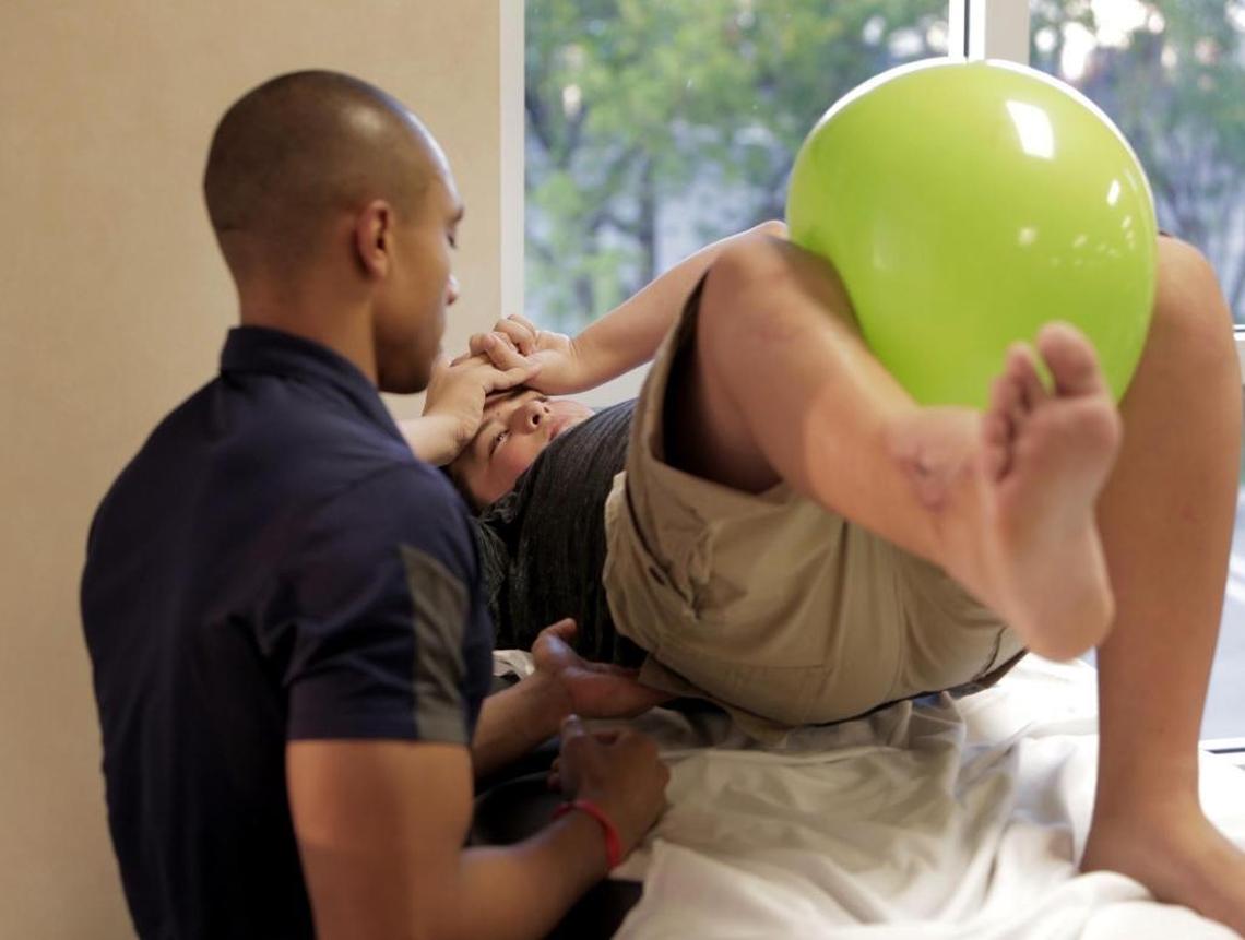 Under the guidance of Leonard Gordon Jr., Kyle Laman goes though a therapy session at U18 Sports Medicine in Coral Springs. Laman attends physical therapy twice a week for his right ankle.