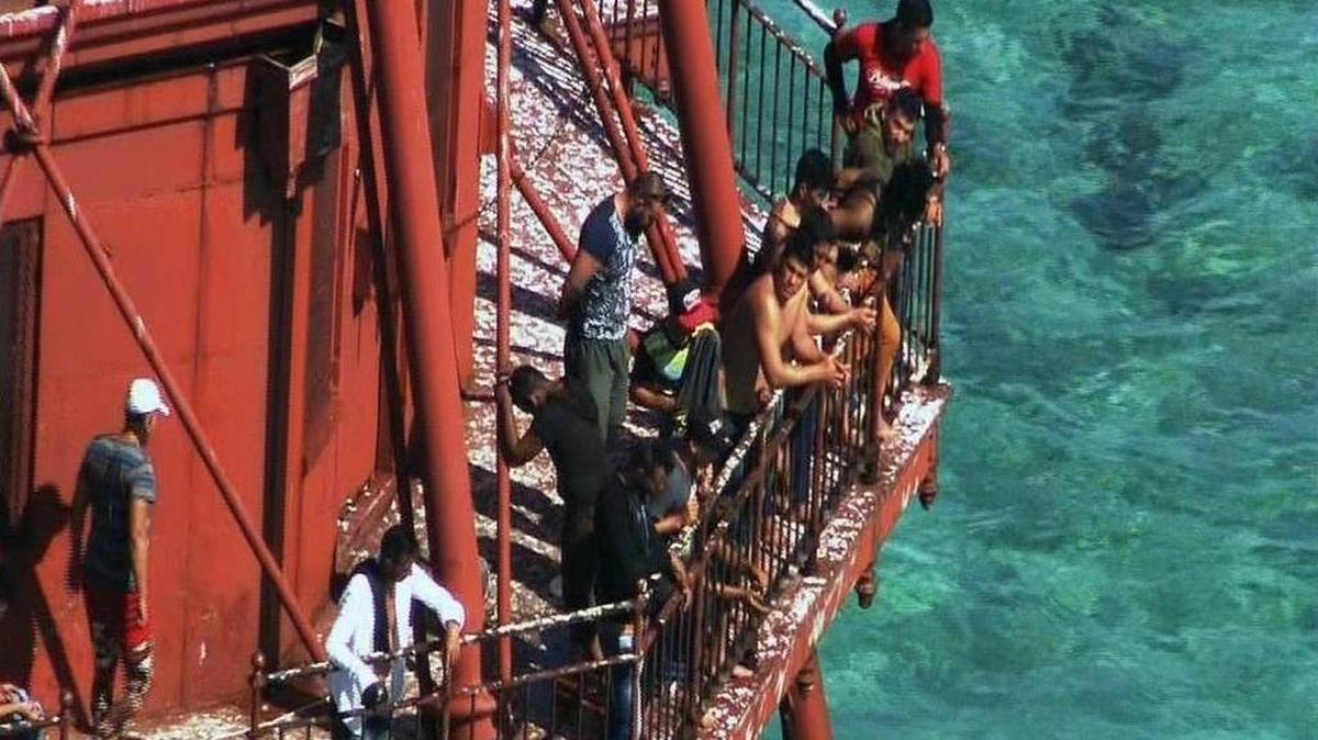 Group of Cubans atop American Shoal Lighthouse off Sugarloaf Key in standoff with Coast Guard on Friday, May 20, 2016.