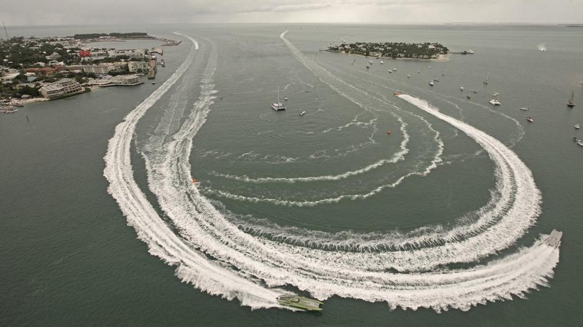 Superboat Unlimited class boats make the turn in Key West Harbor during the Key West World Championship Wednesday, Nov. 5, 2014, in Key West.