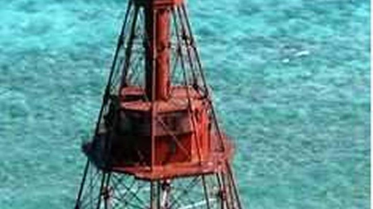 American Shoal Light is one of three historic Florida Keys lighthouses the federal government has put up for auction. 