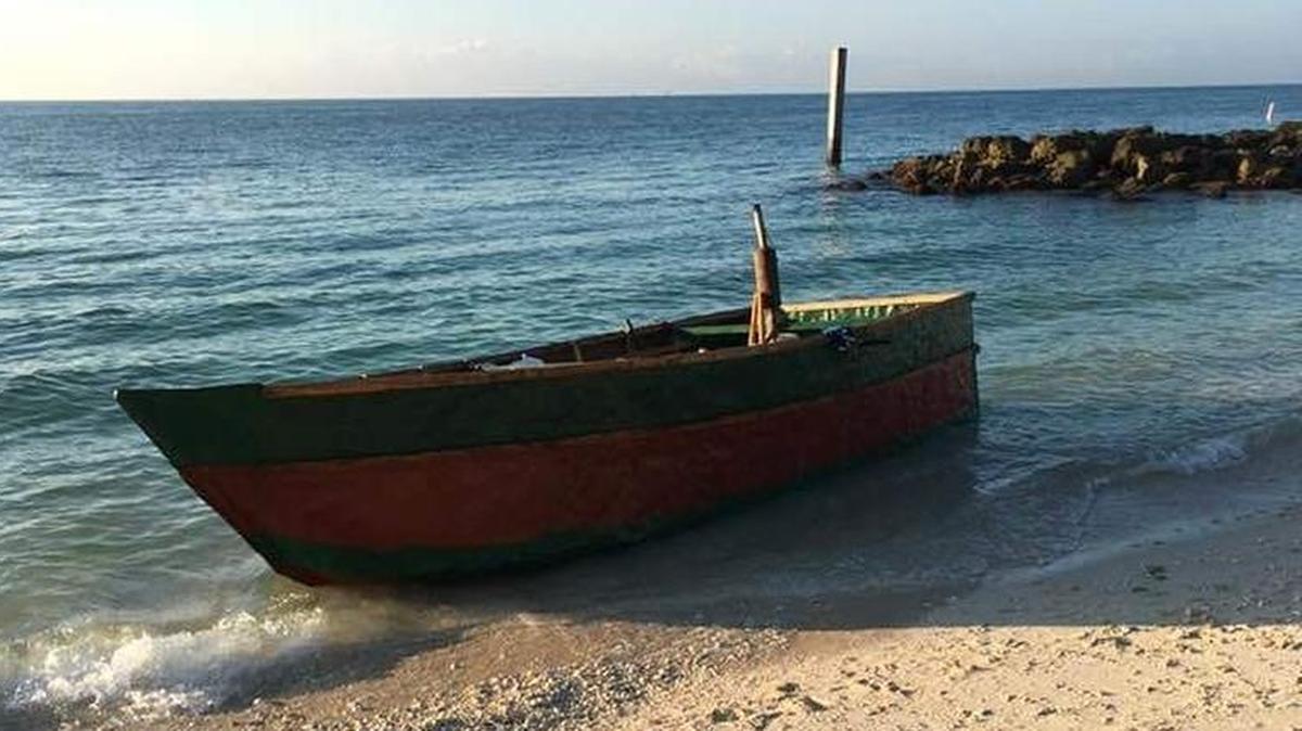 Seven people from Cuba landed at Fort Zachary Taylor Park in Key West in this rustic vessel Friday, Dec. 22.